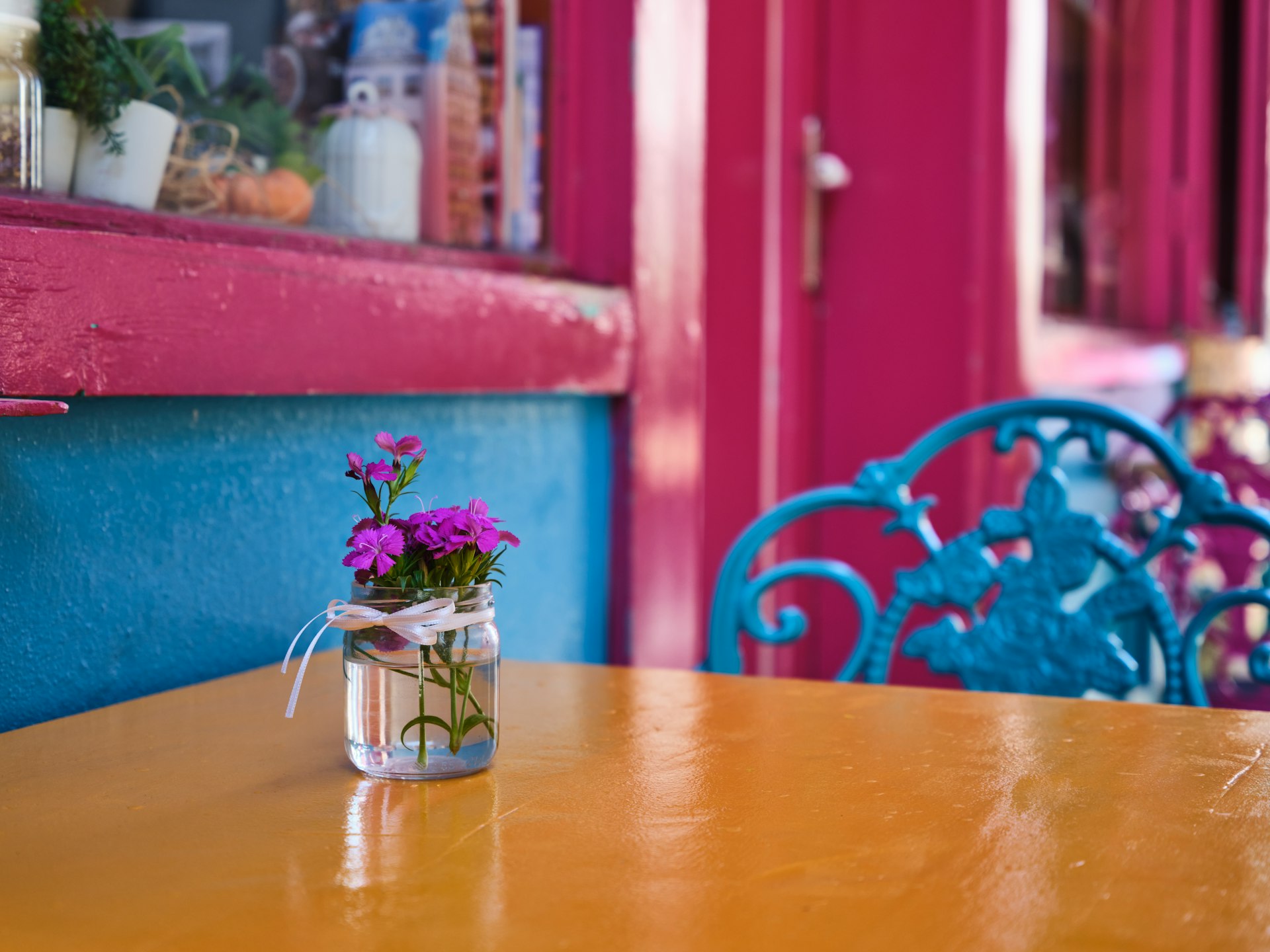 a table with a vase of flowers on it